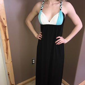 Black empire-style dress with braided straps